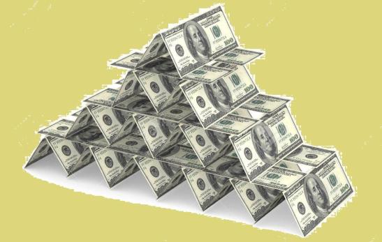 16162555-castillo-de-naipes-hechas-de-billetes-de-100-d-lares-foto-de-archivo