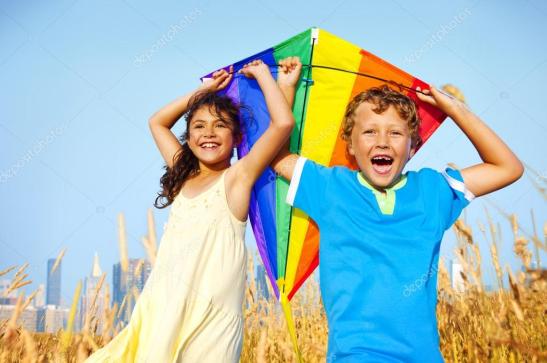 depositphotos_80201522-stock-photo-cheerful-children-playing-kite