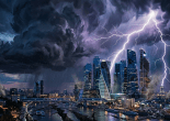 Modern city skyline with lightning bolts striking amid dark storm clouds and rain at night