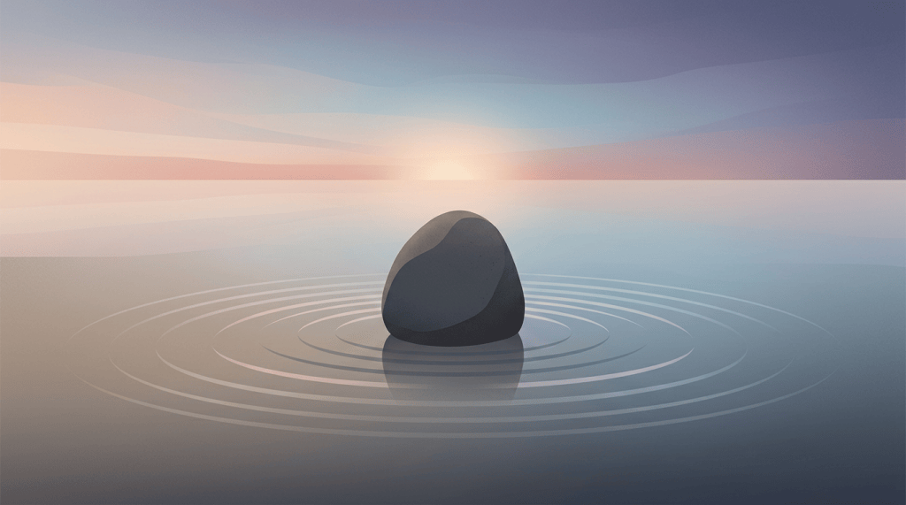 Dark stone centered in reflective water with circular ripples